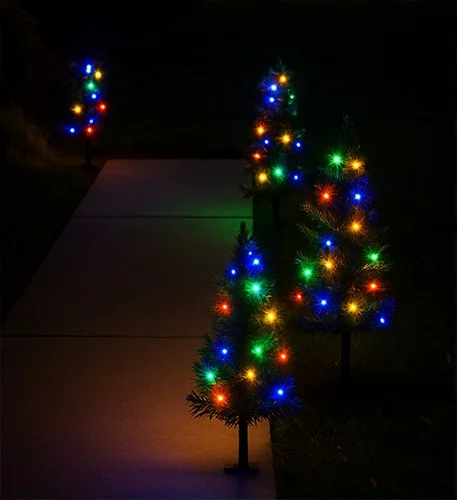 Outdoor solar-powered Christmas tree pathway lights. - Image 2